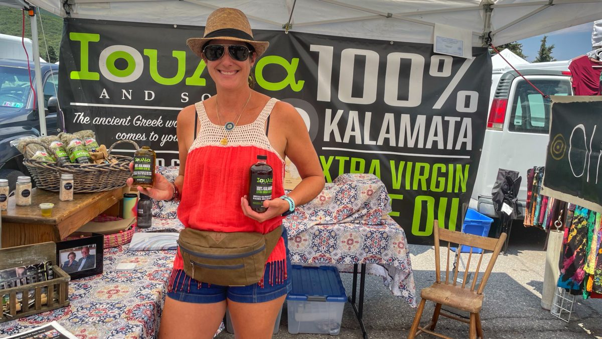 Christina Bhanos at the Farmer's Market Stand.