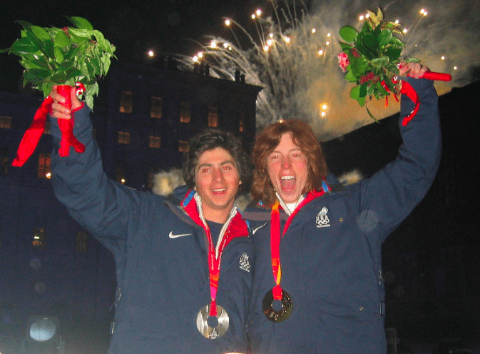 Shaun White and Daniel Kass posing for a photo after winning gold and silver at the 2006 Turin Olympics.