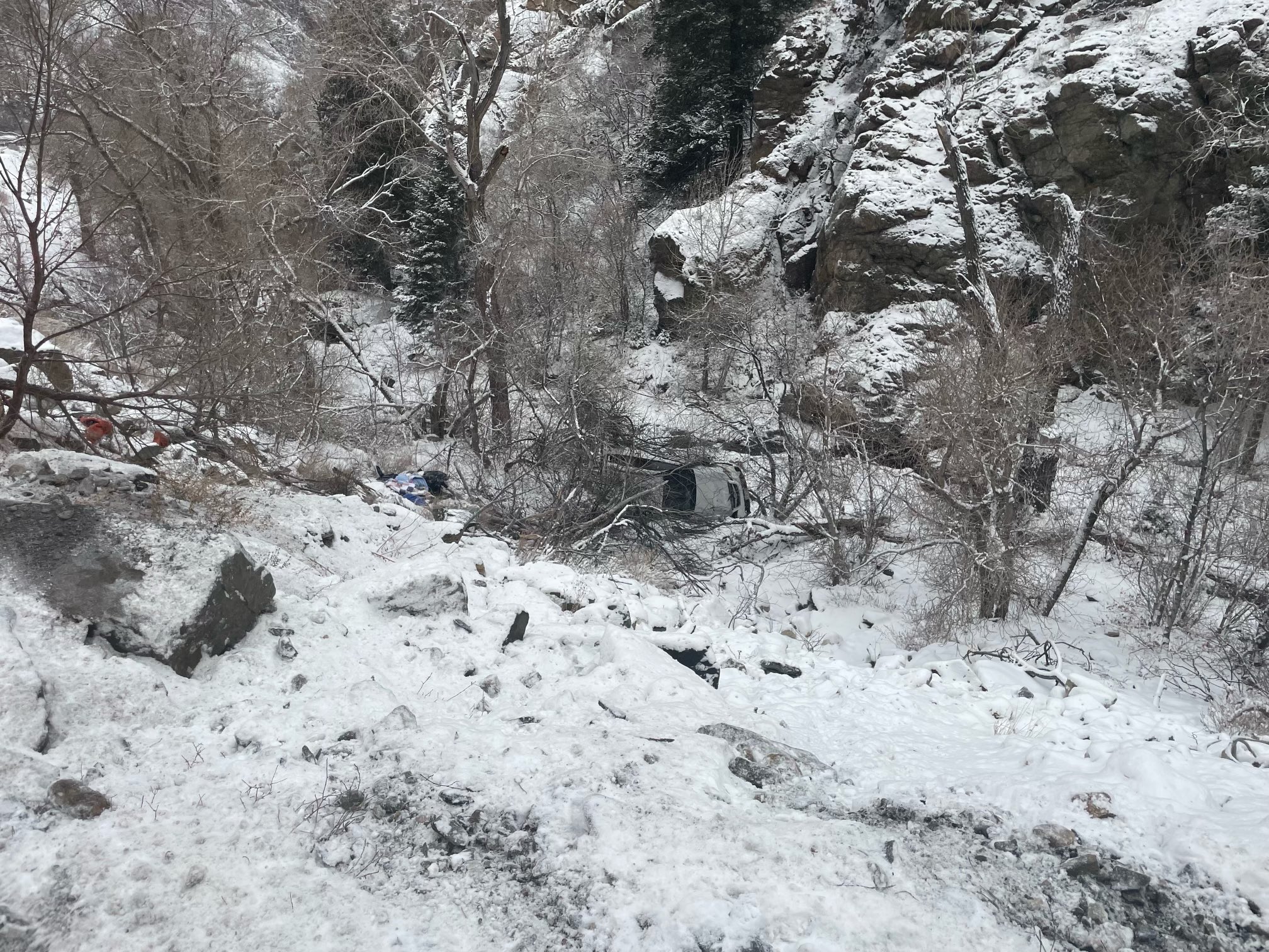 A vehicle slid off the road during the evening commute out of Big Cottonwood Canyon on Monday.