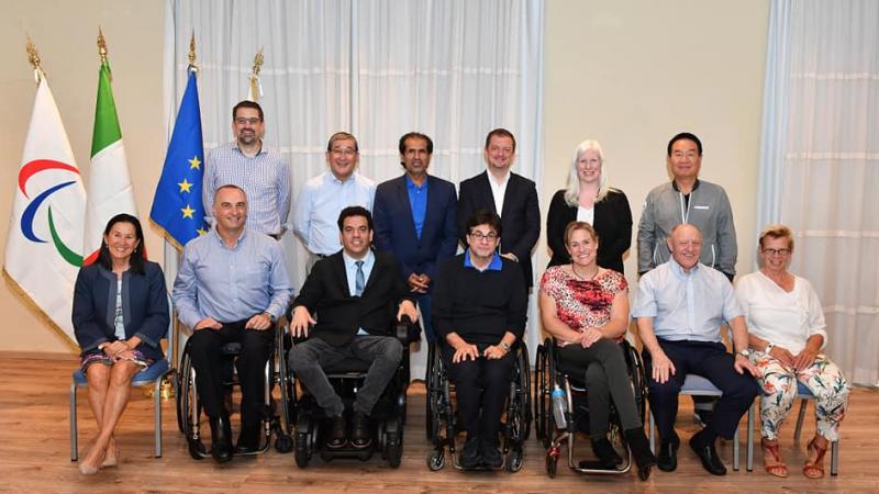 Muffy Davis (third from the right on the bottom row) with her fellow Governing Board members of The International Paralympic Committee.