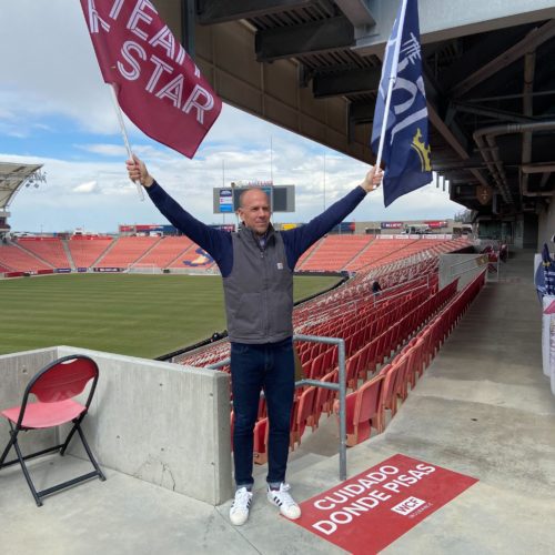 Real Salt Lake President John Kimball showing off the new team flags.