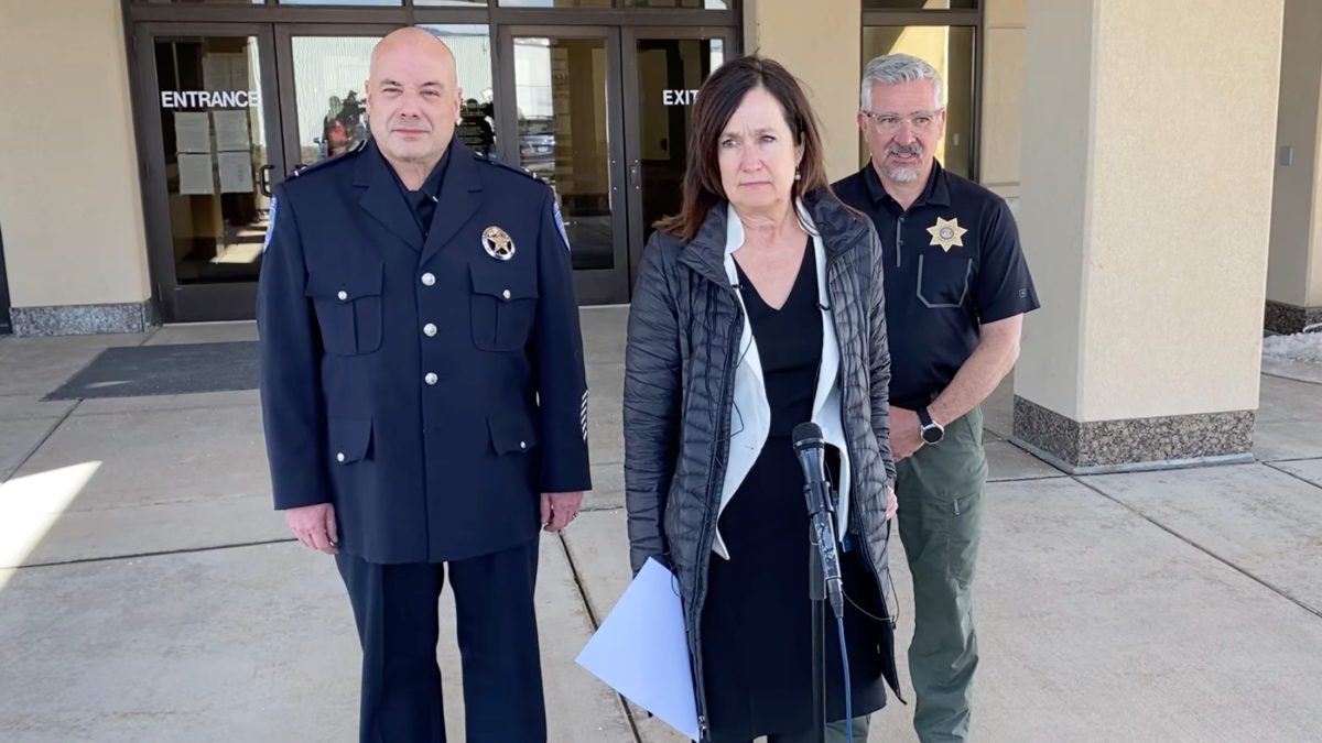 Summit County Attorney Margaret Olson (center) with Park City Police Lieutenant Darwin Little (left) and Summit County Sheriff Justin Martinez (right) at a press conference on Monday.