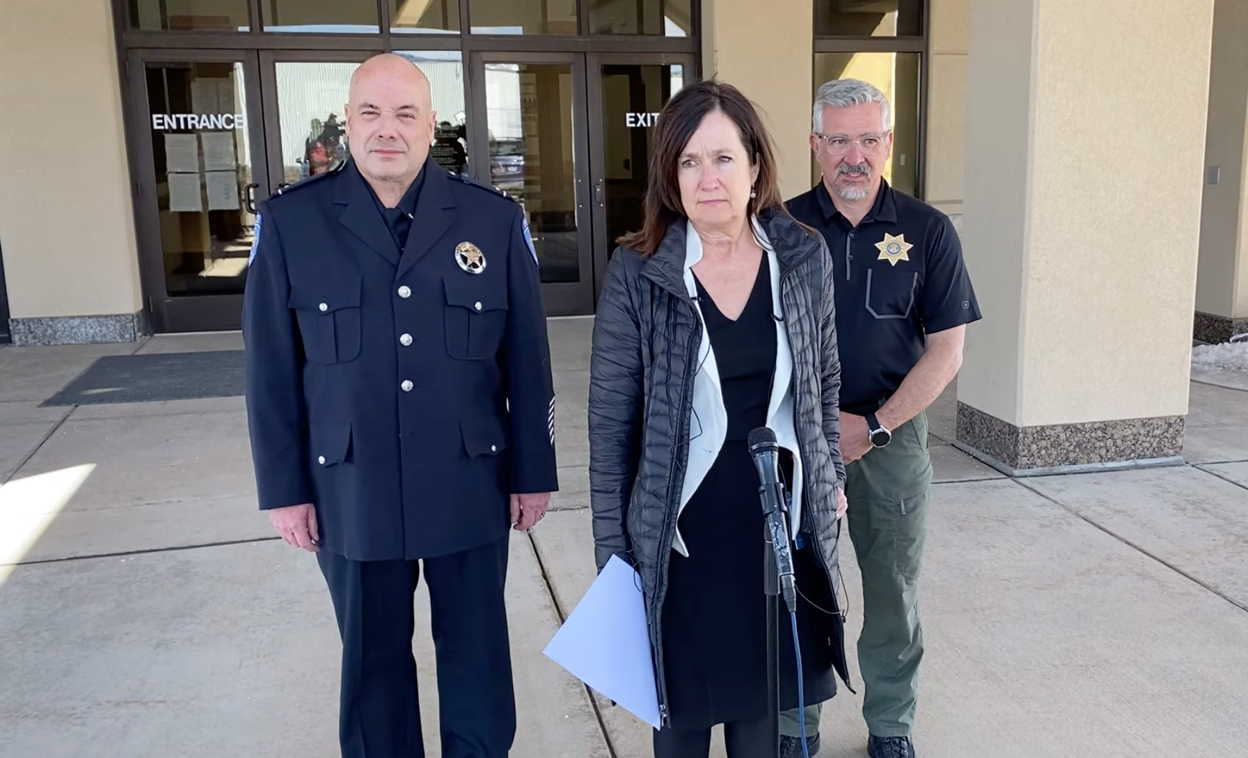 Summit County Attorney Margaret Olson (center) with Park City Police Lieutenant Darwin Little (left) and Summit County Sheriff Justin Martinez (right) at a press conference on Monday.