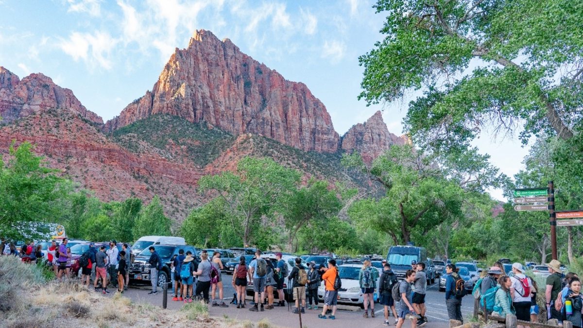 Visitors wait to board the Zion Canyon shuttle on Memorial Day Weekend in 2021 near the Zion Canyon Visitor Center.