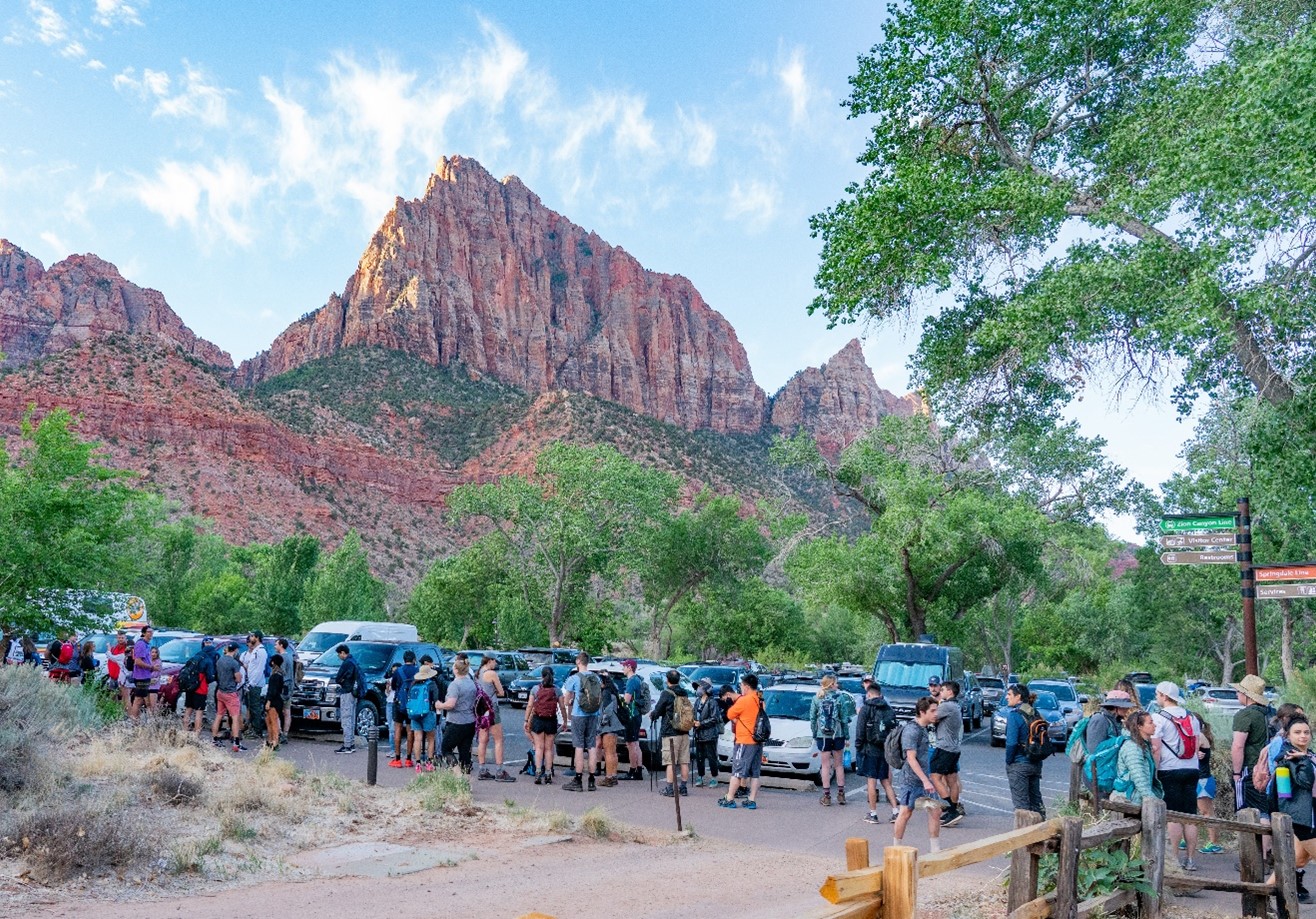 Visitors wait to board the Zion Canyon shuttle on Memorial Day Weekend in 2021 near the Zion Canyon Visitor Center.