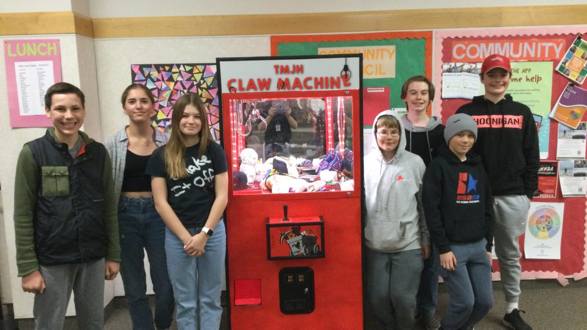 Treasure Mountain Jr. High School students built a Claw Machine for the school. (Partial picture, out of order): Construction Team: Lucas Baldwin, Guillermo Barrett, Finnegan Evans, and Lincoln Larson. Art Team: Kate Morgan, Reese Laasko, Kyler Collier, and Amelie Peay.