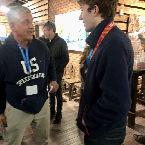 Dr. Eric Heiden mingling with Casey Dawson about all their speed skating experiences decades apart.