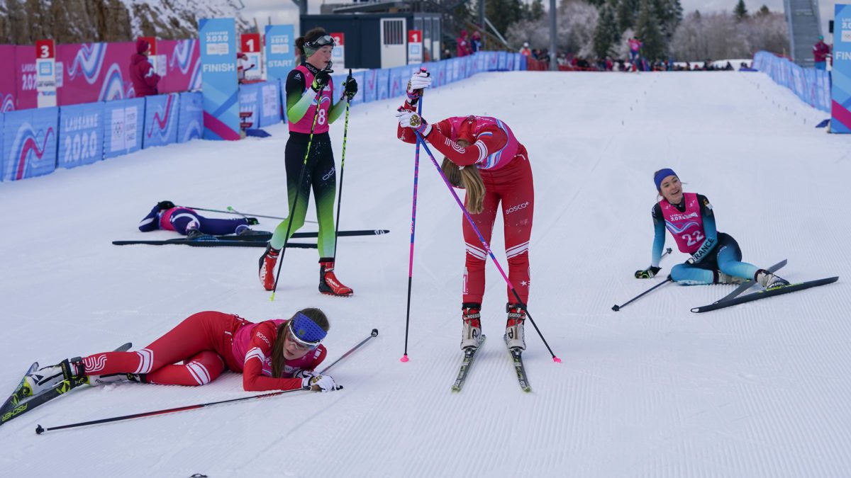 Athletes who just crossed the finish line in the Women's Nordic Combined event at the Lausanne 2020 Youth Olympic Games.