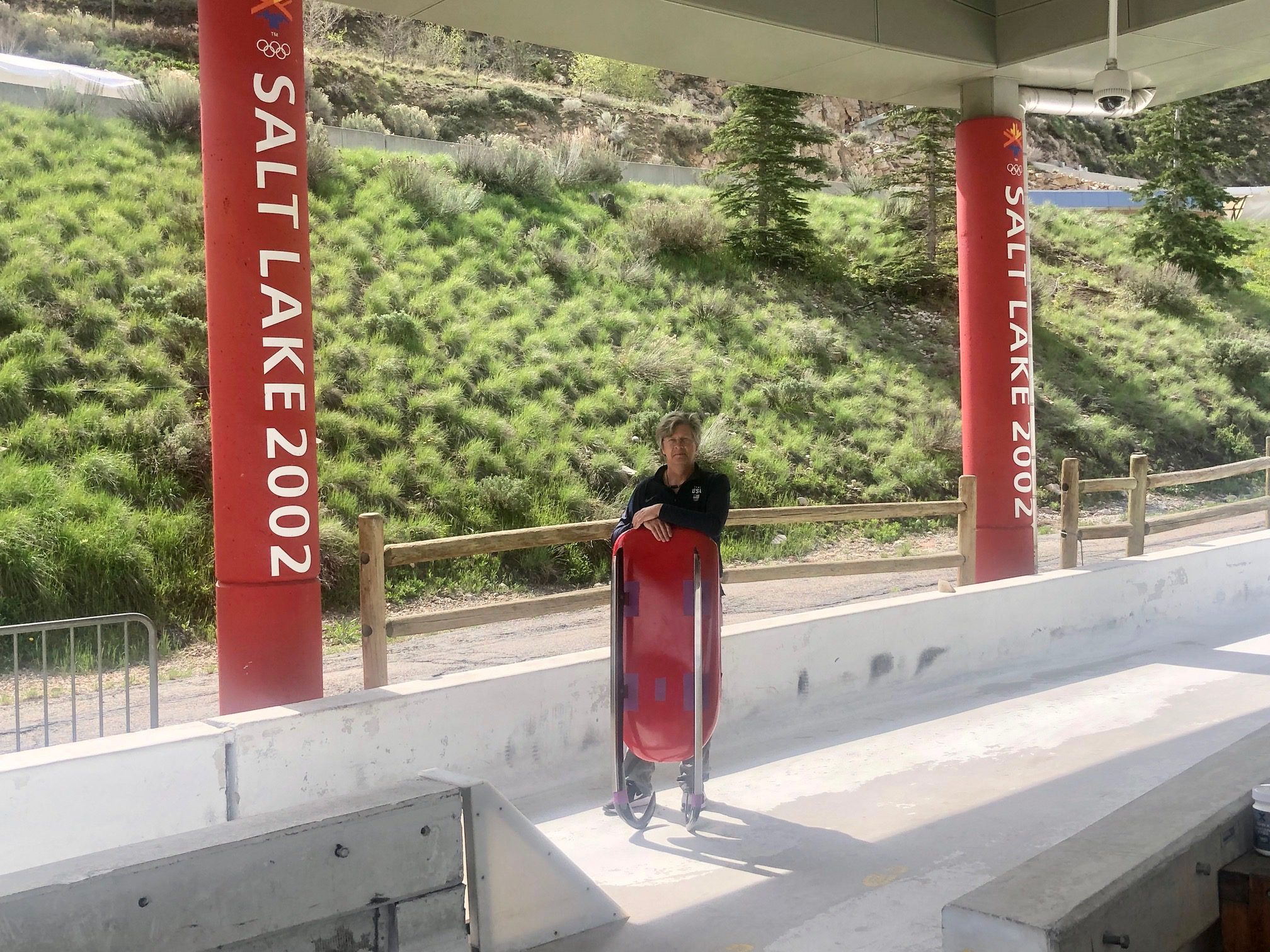 This photo of John Owen, holding a luge sled pod used by Olympic silver medalist Chris Mazdzer, was taken in June, 2022, 22 years after Owen was the first Luger down the 2002 track.