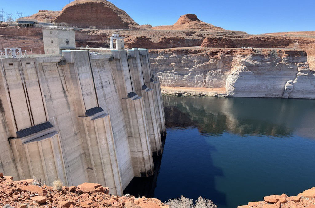 The Glen Canyon Dam in April 2022. Federal water officials have announced that they will keep hundreds of billions of gallons of Colorado River water inside Lake Powell instead of letting it flow downstream to southwestern states and Mexico.