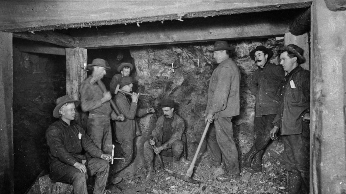 Miners in a stope, ca.1900s.