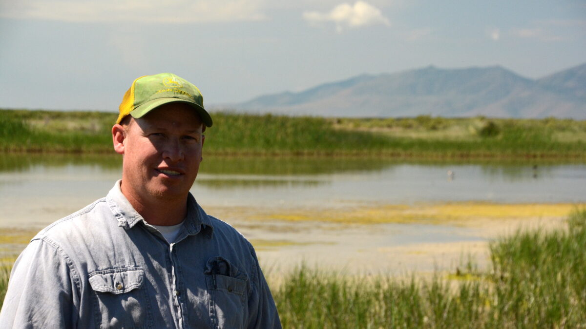 Rep. Joel Ferry in front of a wetland located on the 30-acres his family donated to establish the Bear River Watershed Conservation Area in northern Utah.