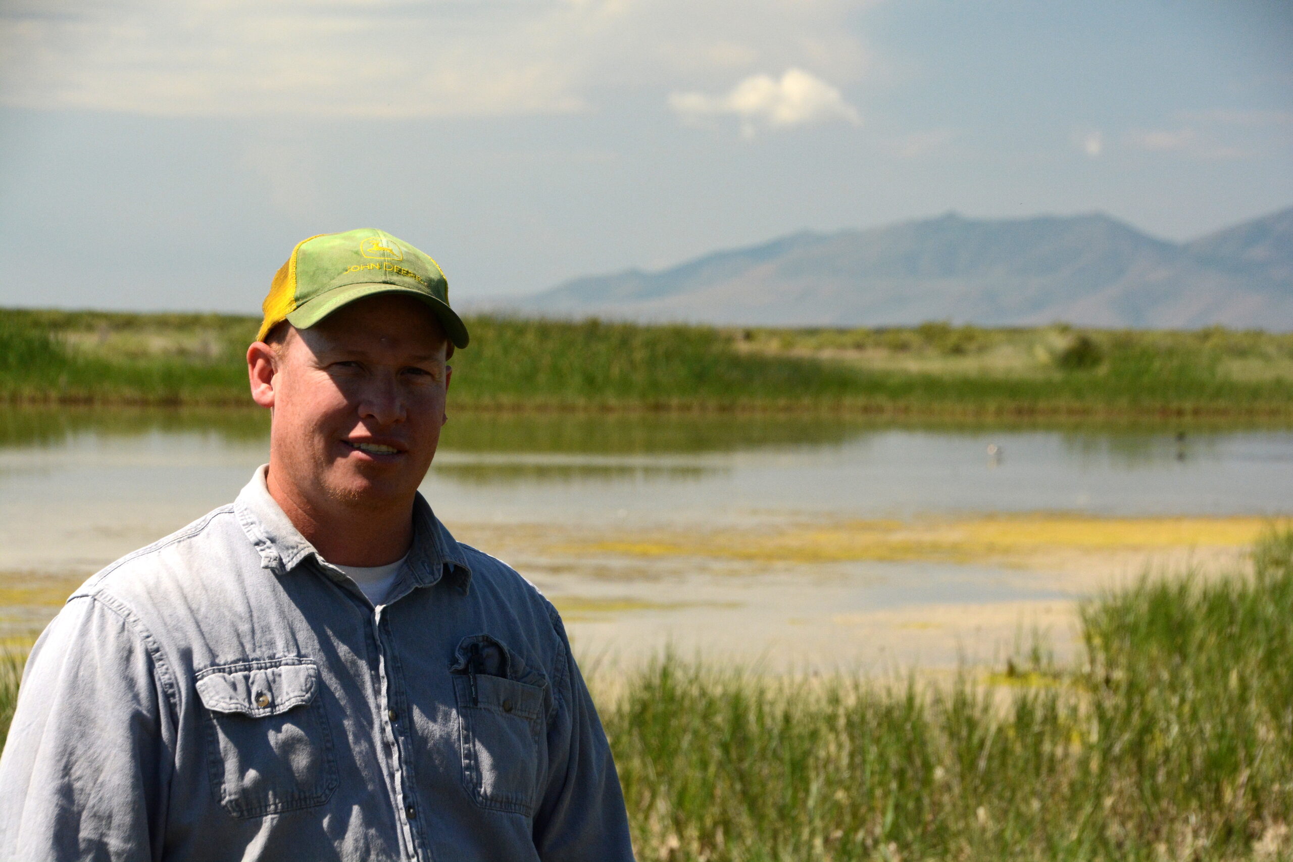 Rep. Joel Ferry in front of a wetland located on the 30-acres his family donated to establish the Bear River Watershed Conservation Area in northern Utah.