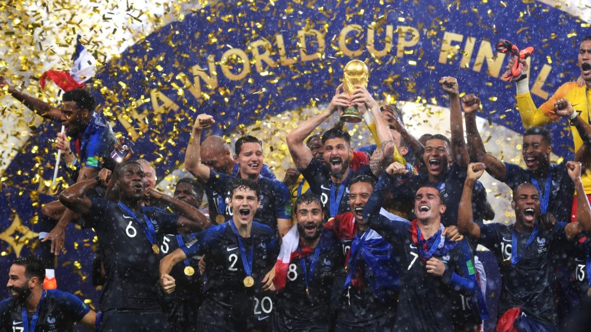 The French squad celebrating after winning the 2018 World Cup.
