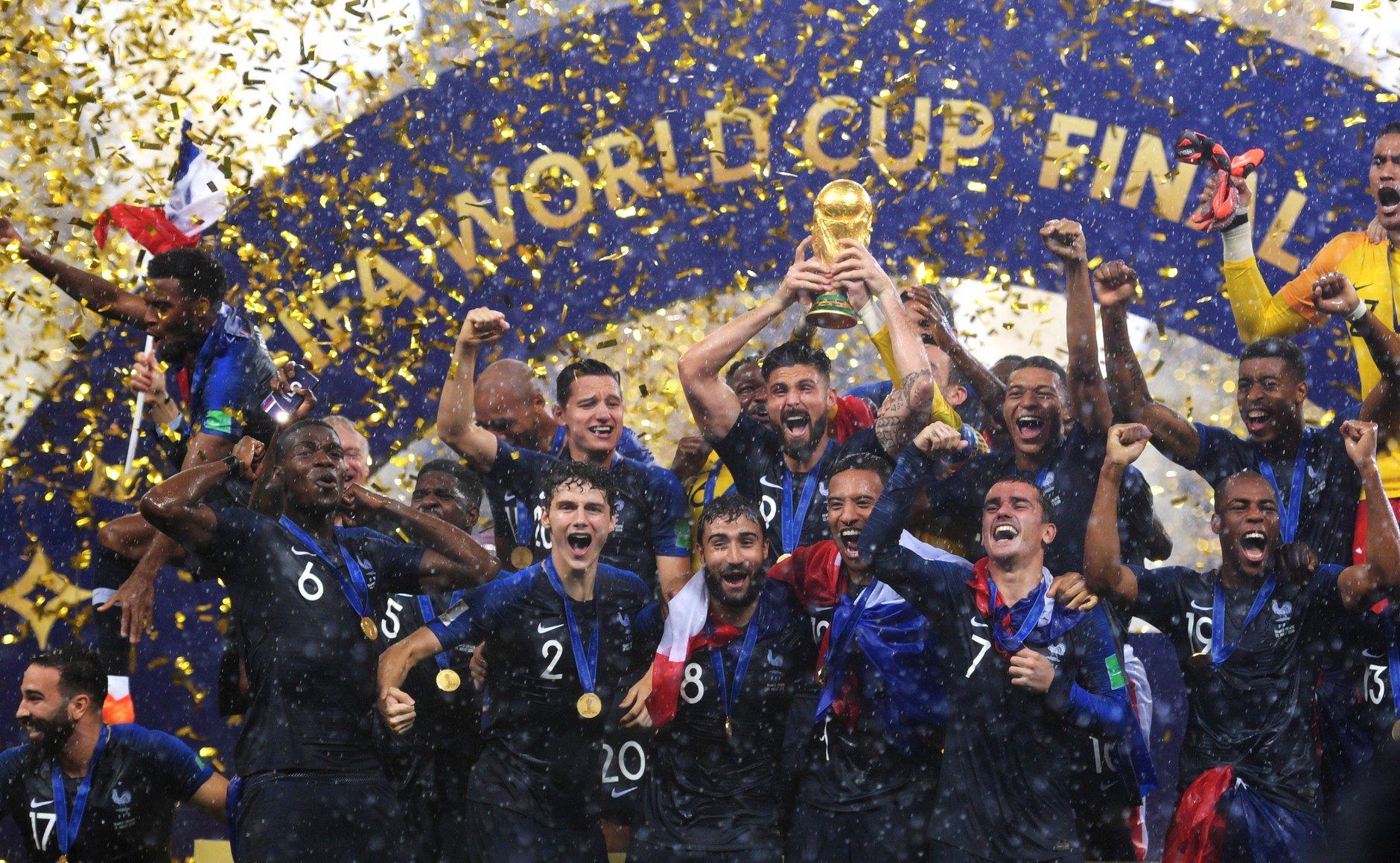 The French squad celebrating after winning the 2018 World Cup.