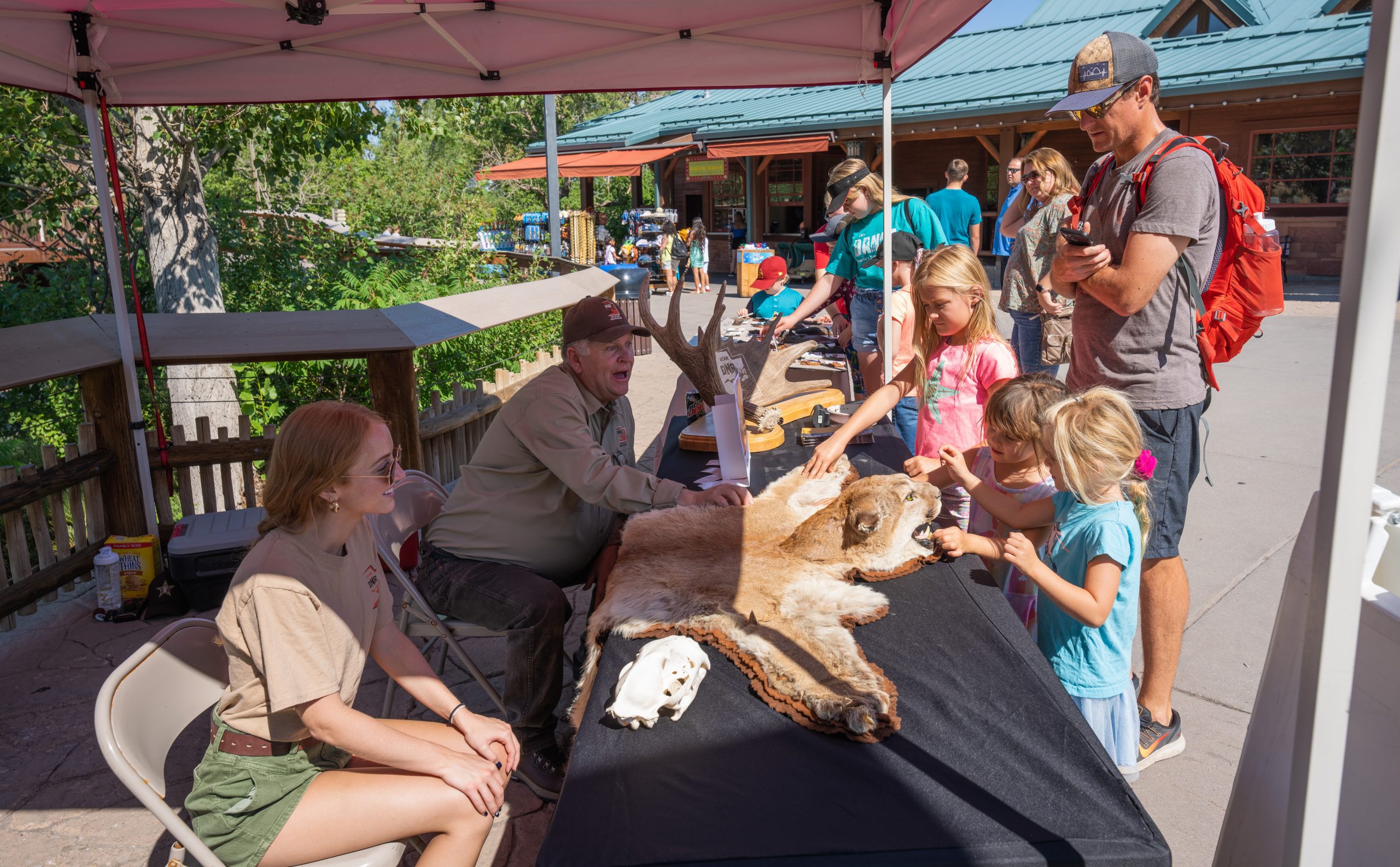 The DWR booth teaching families about wildlife safety