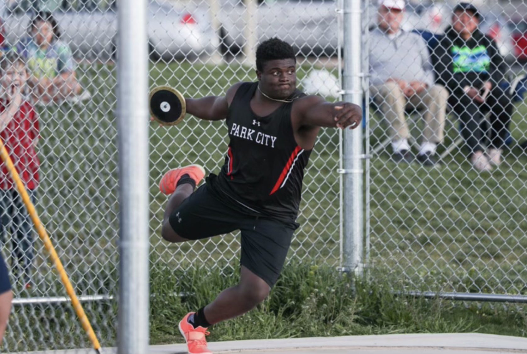 PC High grad Jesse Helton throwing discus and breaking records.