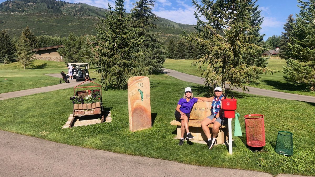 (L) Rina Slade and (R) Melissa Stockton at the Park City Golf Course. The two were cart partners in the Park City Golf Tournament and now Stockton is off to the Deaf Golf World Championships in Hawaii.