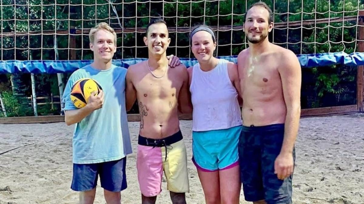 The first and second place teams at the doubles, sand volleyball tournament.