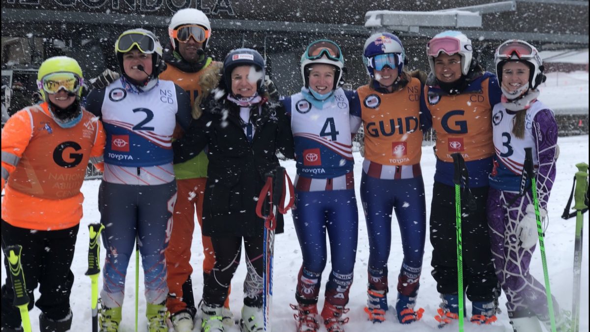Female athletes with disabilities competing in alpine ski racing including Rob and Danelle Umstead.