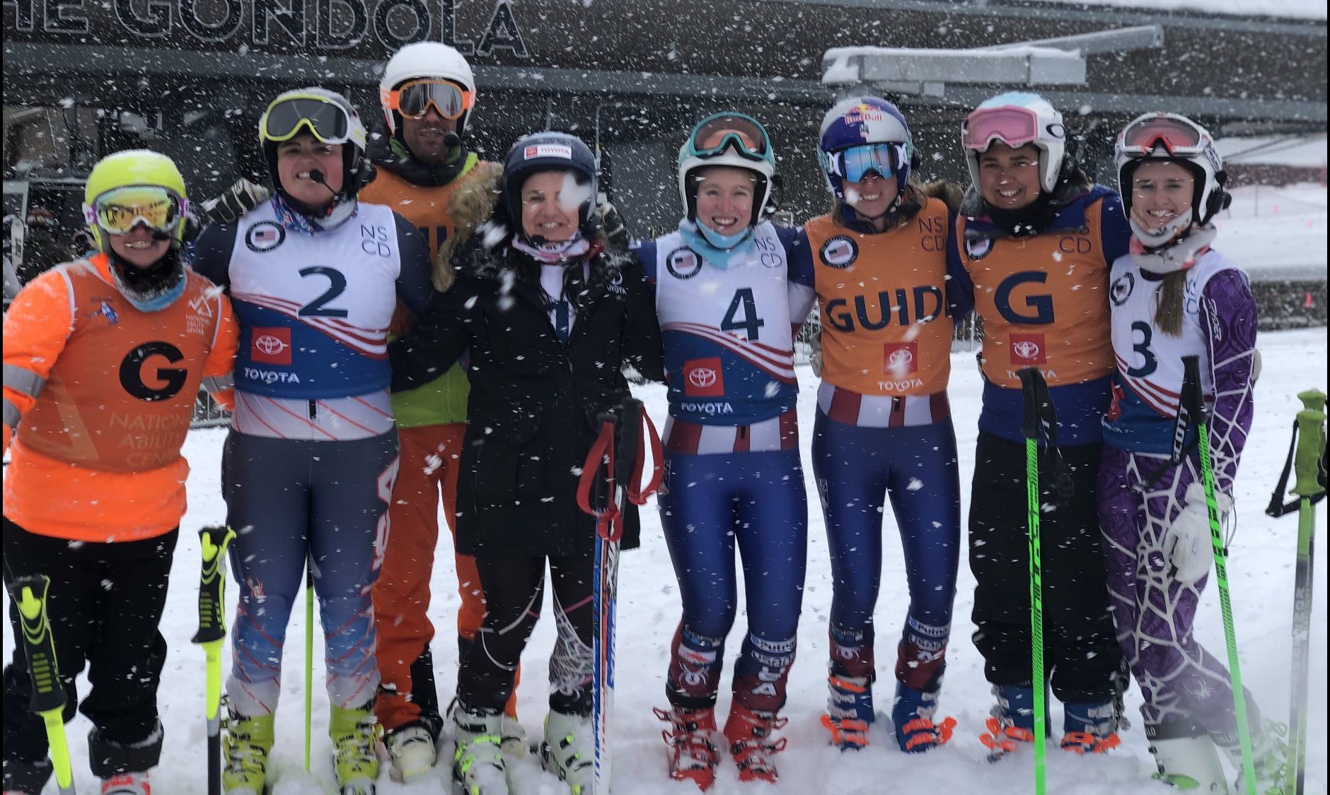 Female athletes with disabilities competing in alpine ski racing including Rob and Danelle Umstead.