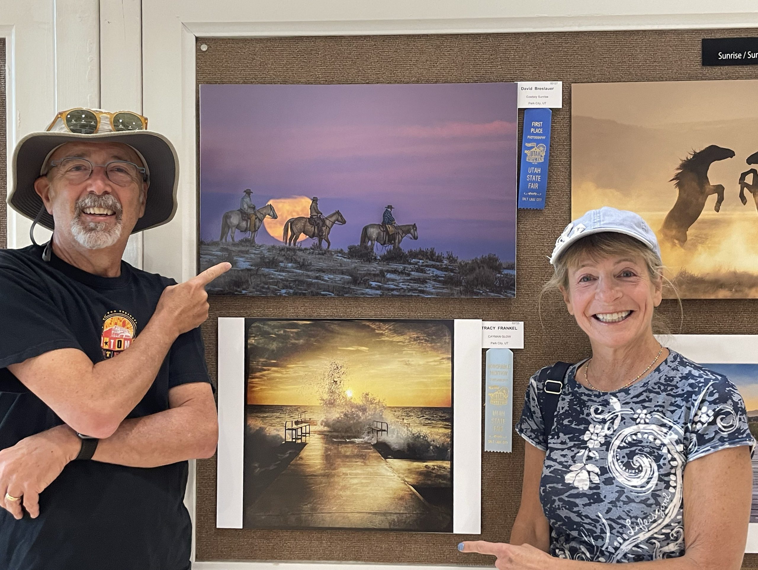 David Breslauer, left, and Tracy Frankel point to their winning entries