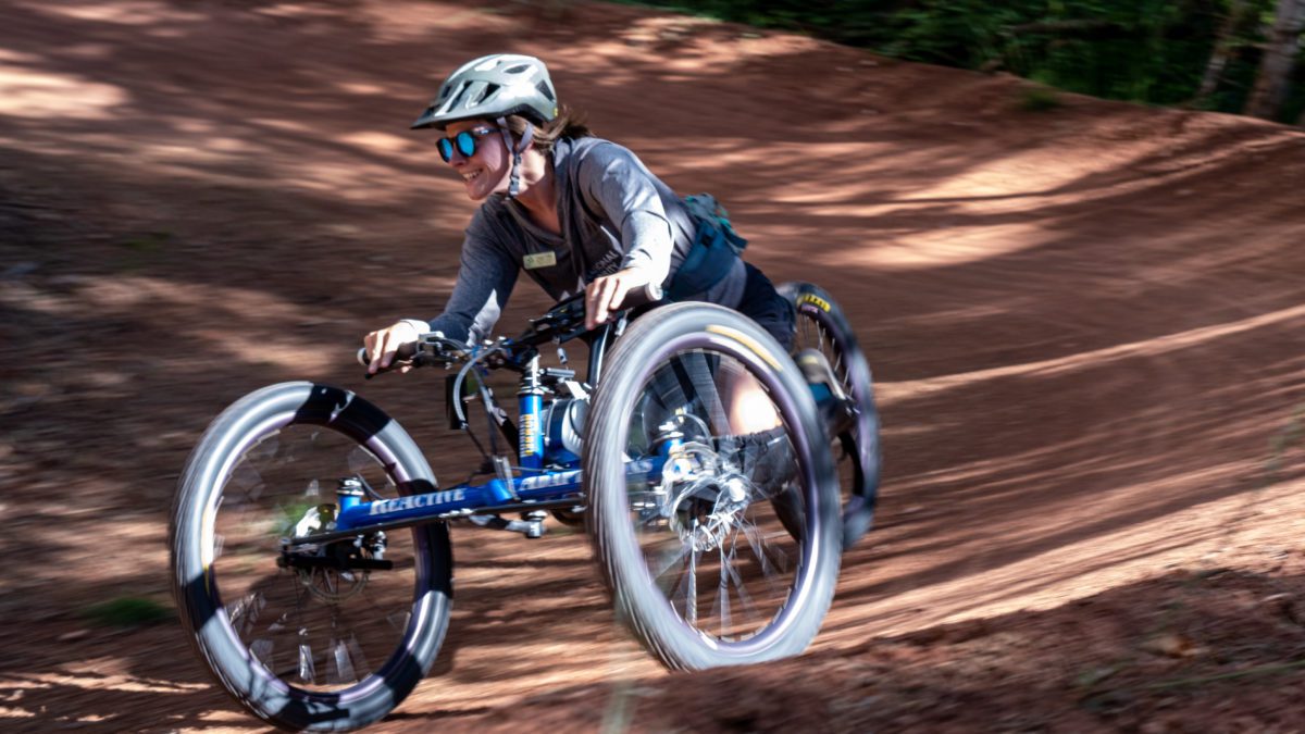 Maggie Gettys on her adaptive mountian bike