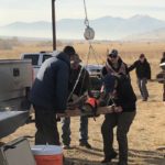 DWR takes weight measurements on a mule deer