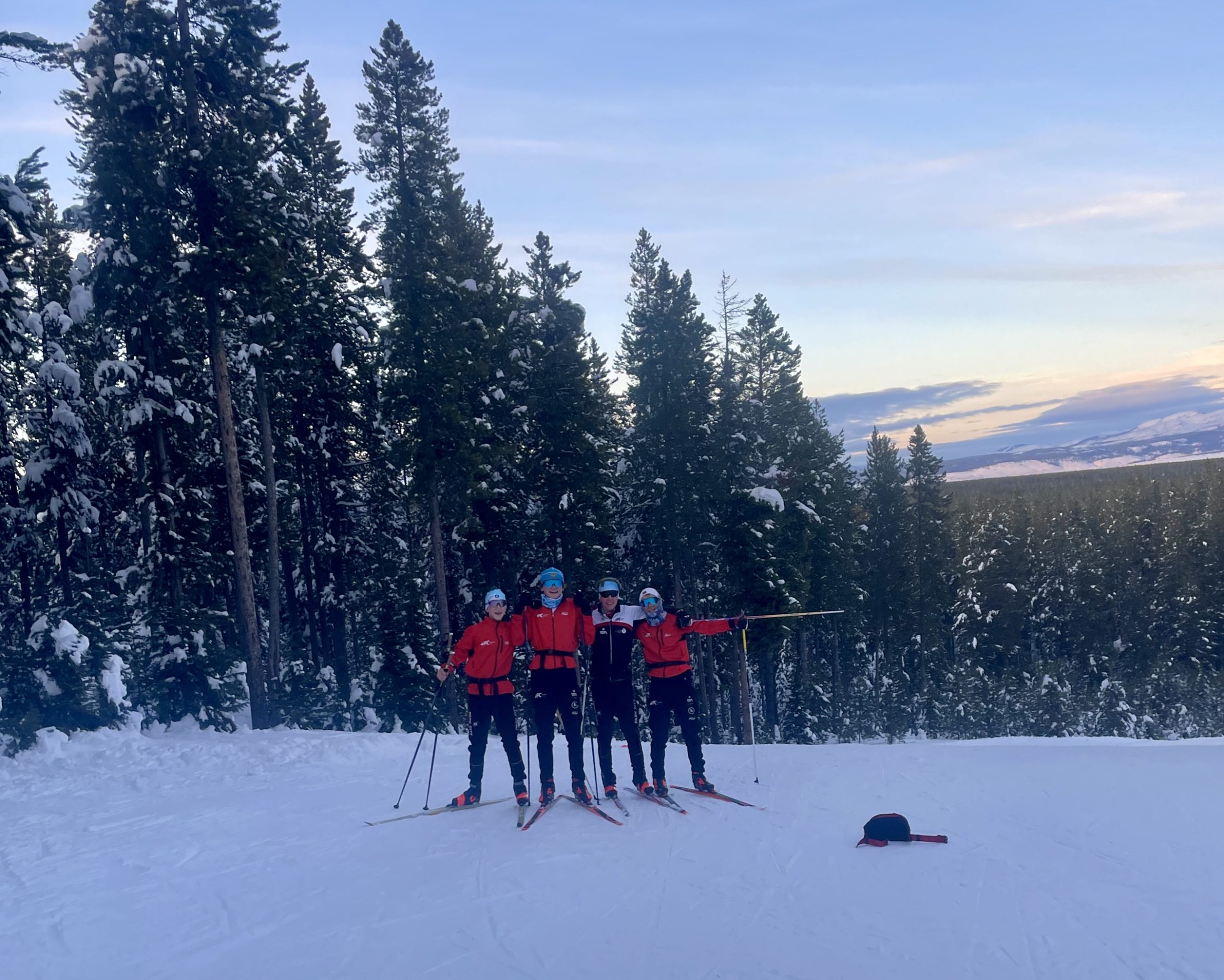 (L-R) PCSS Coach Drew Palmer-Ledger with athletes Trey Hudson, Lucas Fassio, and 1st place race finnisher Toey Hoffman training in West Yellowstone, MT.