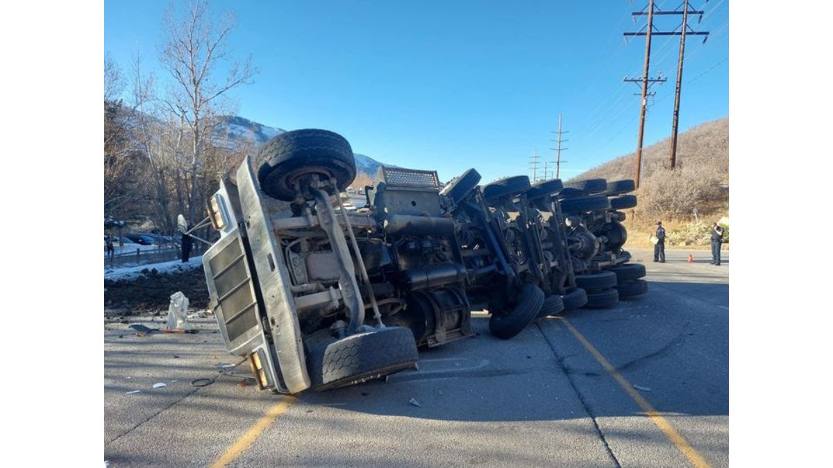 A dump truck carrying dirt rolled on Deer Valley Drive.