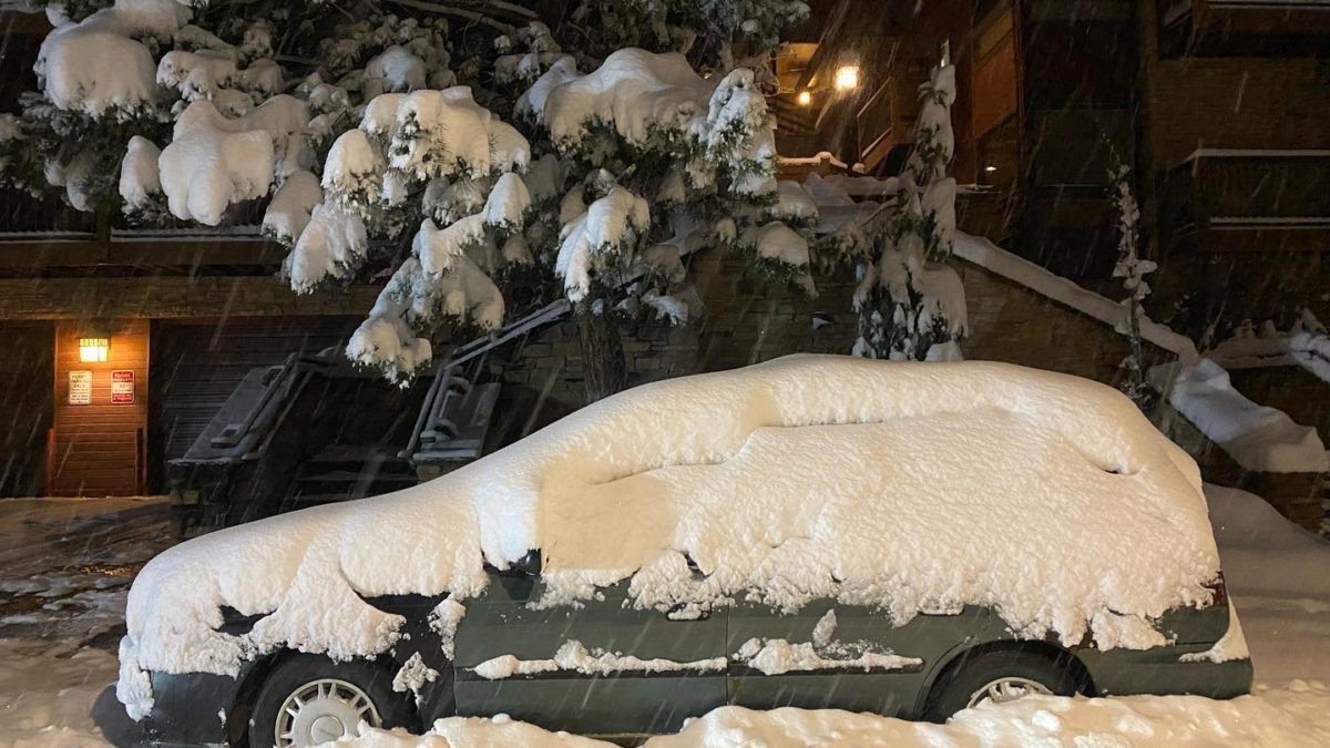 Snow covered car in Park City from recent storm