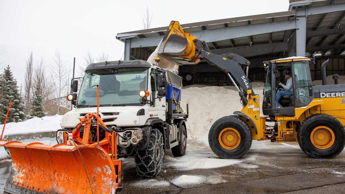 Park City Public Works snow plow being restocked with salt.
