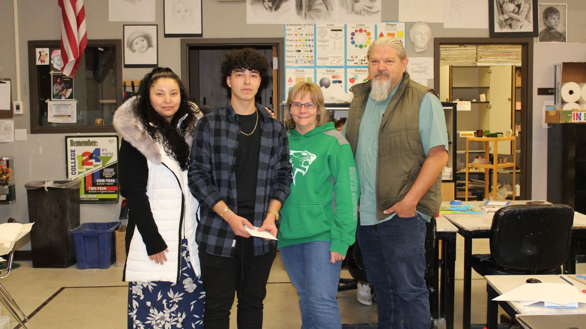 From left to right Lucia Patino, Angel Rodriguez's mother, student winner Angel Rodriguez, teacher Sue Shuppy, SSHS Principal Chris Jenson.