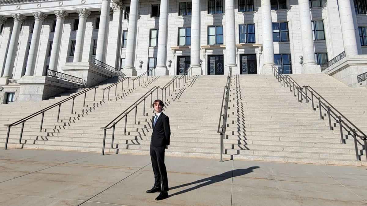 PCHS student Jackson Smith stands outside the Utah State Capitol Building.