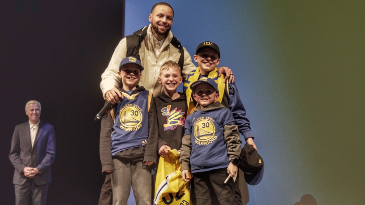 Steph Curry takes a photo with Beckley (12), McKay (11), Crew (11), and Taggart (8) Brown, after the Q&A portion at the world premiere of Stephen Curry: Underrated.