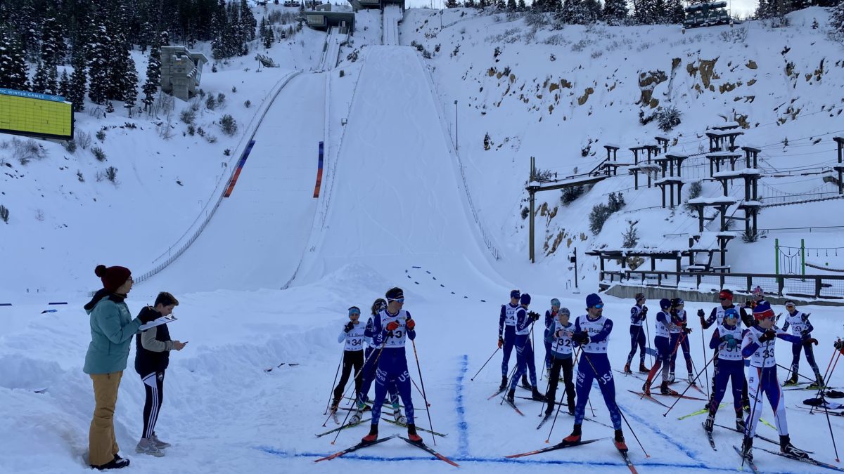 Nordic Combined and Ski Jumping athletes at the Utah Olympic Park starting line. Retired multi-Olympian Taylor Fletcher ceremoniously lead them around the course.