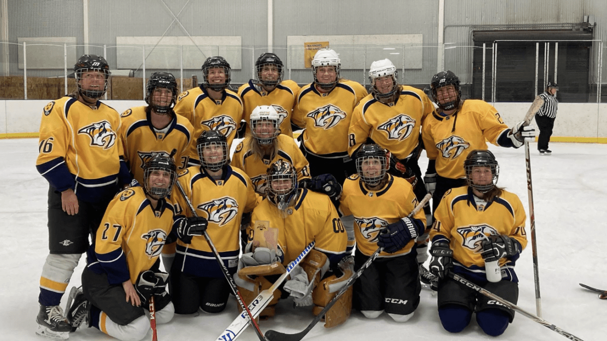Women's hockey's Park City Predators in a photo from a tournament in December where they ended up on the podium in third.