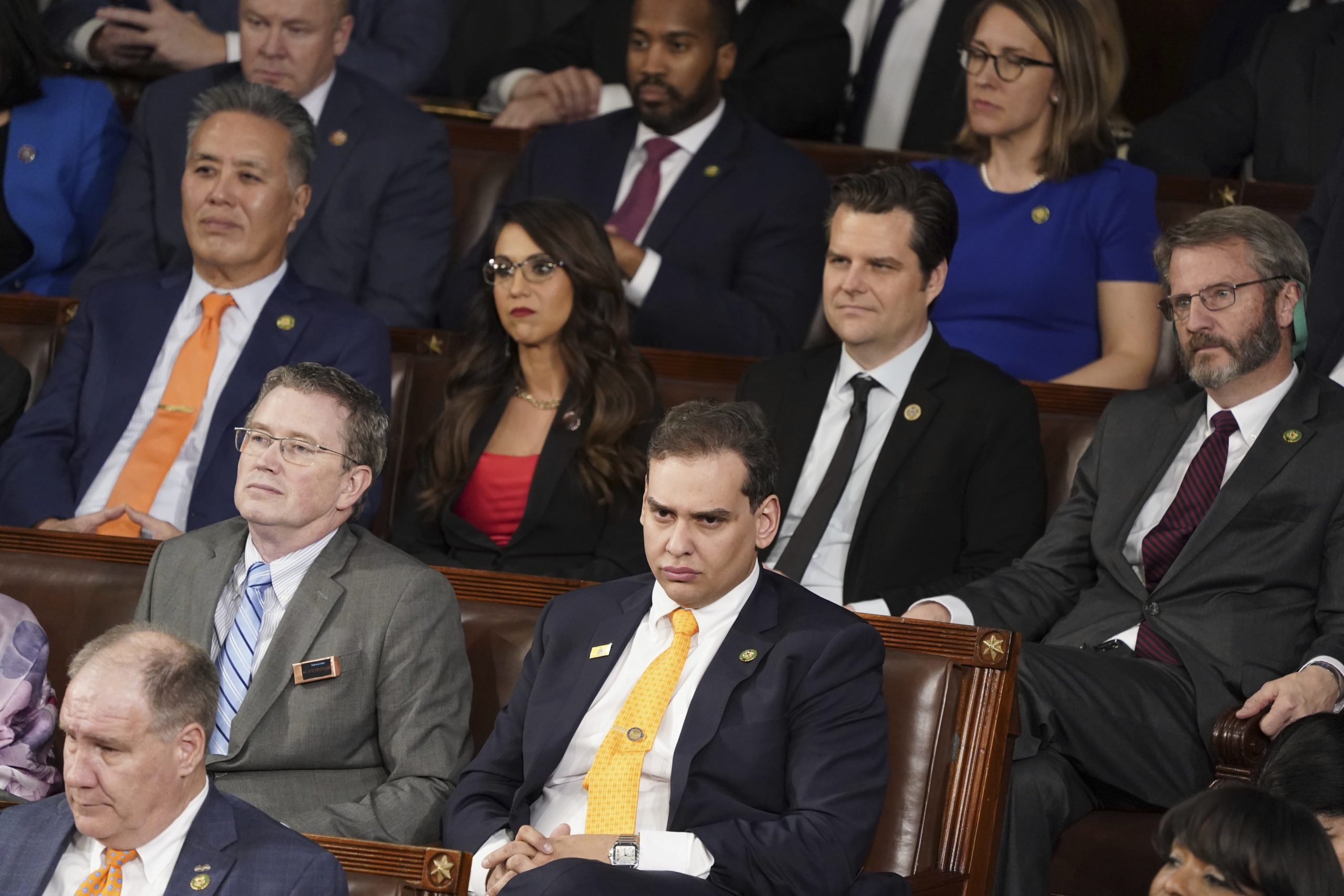 Rep.George Santos, R-N.Y., lower center, and other Republicans, gather in the House Chamber before President Joe Biden arrives to deliver his State of the Union speech to a joint session of Congress, at the Capitol in Washington, Tuesday, Feb. 7, 2023.