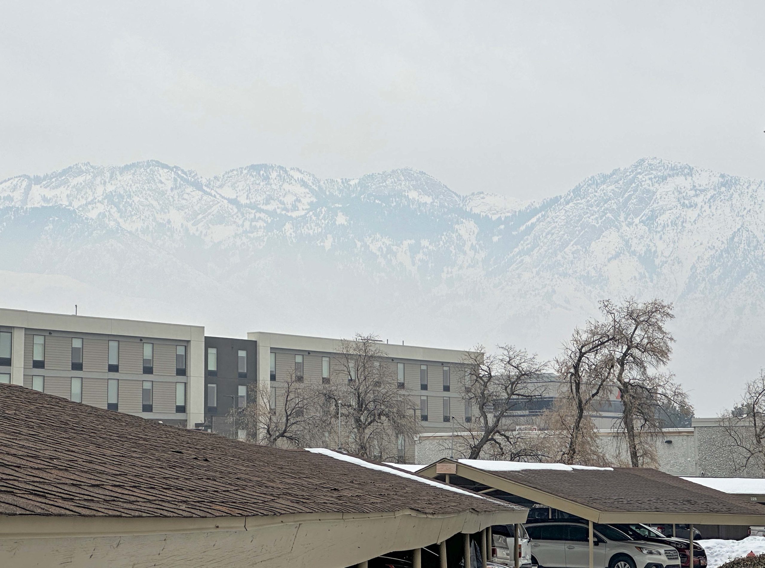 Inversion clouding the view of Mt. Olympus in Salt Lake City on Sunday.