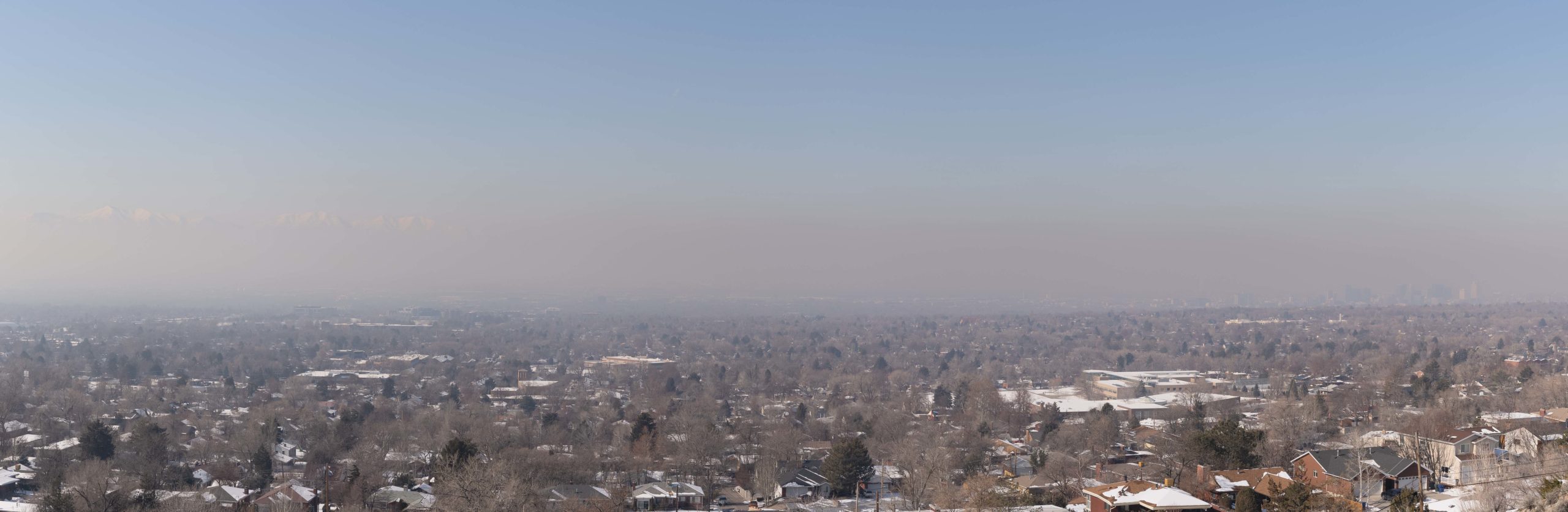View from the foothills of Salt Lake City toward the western mountains and downtown showing the haze from inversion.