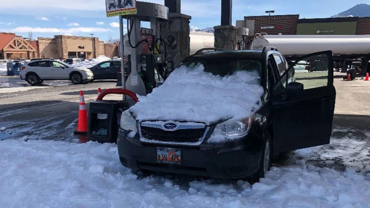 Ice and snow fell from the roof of the Smith's gas station in Kimball Junction onto the car of a local resident, severely damaging the vehicle. Feb. 19, 2023.