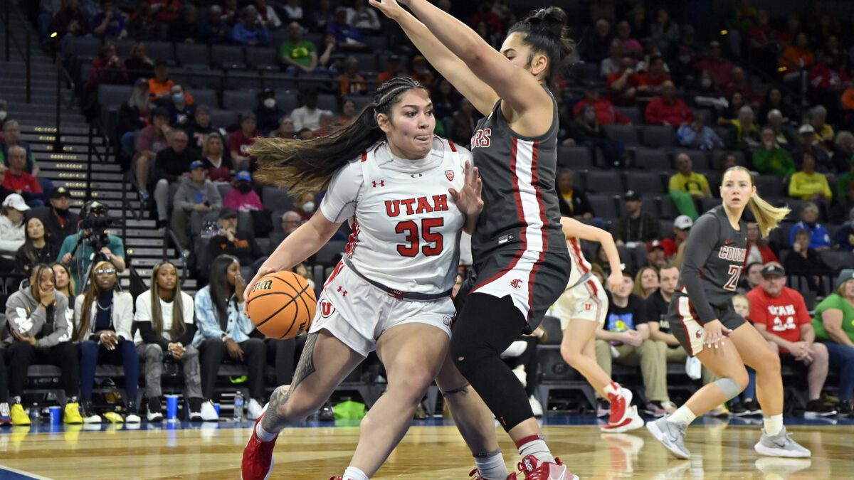 Utah forward Alissa Pili (35) drives against Washington State forward Ula Motuga during the second half of an NCAA college basketball game in the quarterfinals of the Pac-12 women's tournament Thursday, March 2, 2023, in Las Vegas.