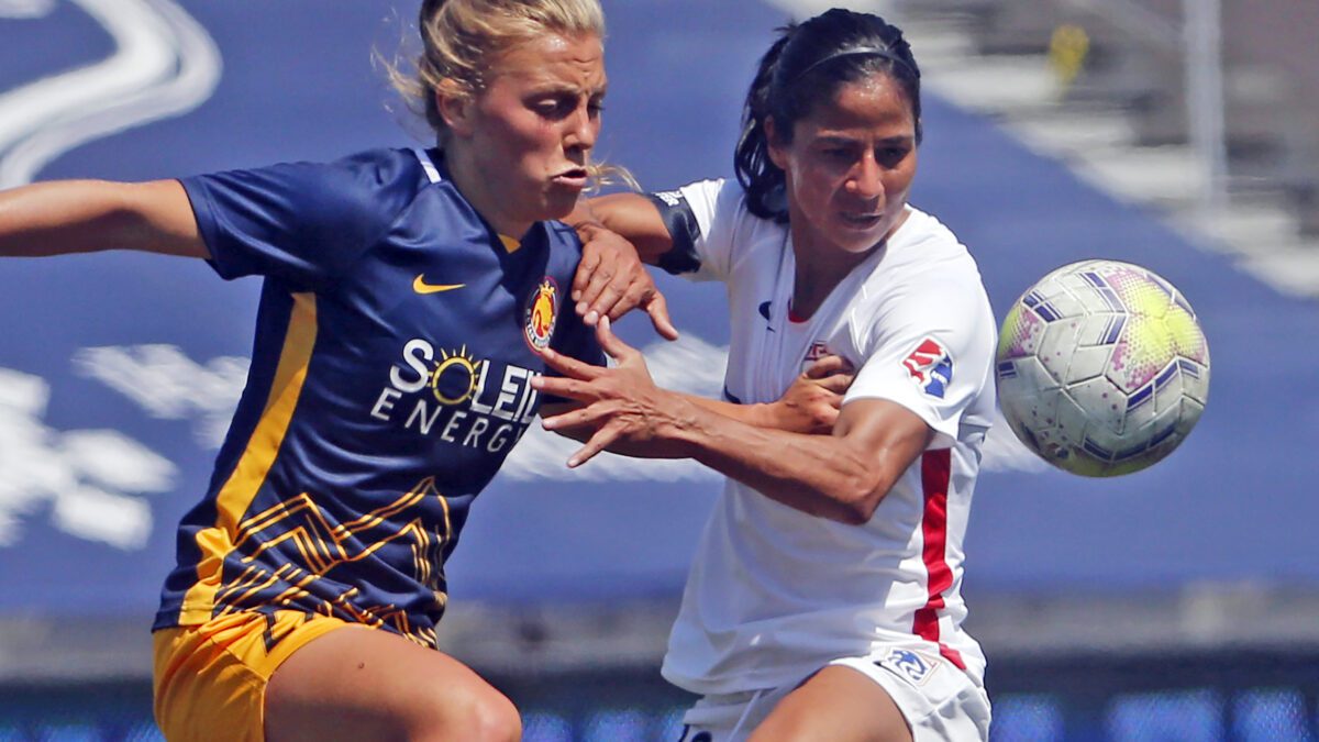 Utah Royals FC defender Madeline Nolf, left, battles with OL Reign midfielder Shirley Cruz, right, during the first half of an NWSL Challenge Cup soccer match at Zions Bank Stadium, Wednesday, July 8, 2020, in Herriman, Utah. The Royals are returning to Utah and the National Women's Soccer League. The NWSL and Major League Soccer's Real Salt Lake announced the second iteration of the Utah Royals on Saturday, March 11, 2023. The Royals were part of the NWSL for three seasons from 2018 to 2020.