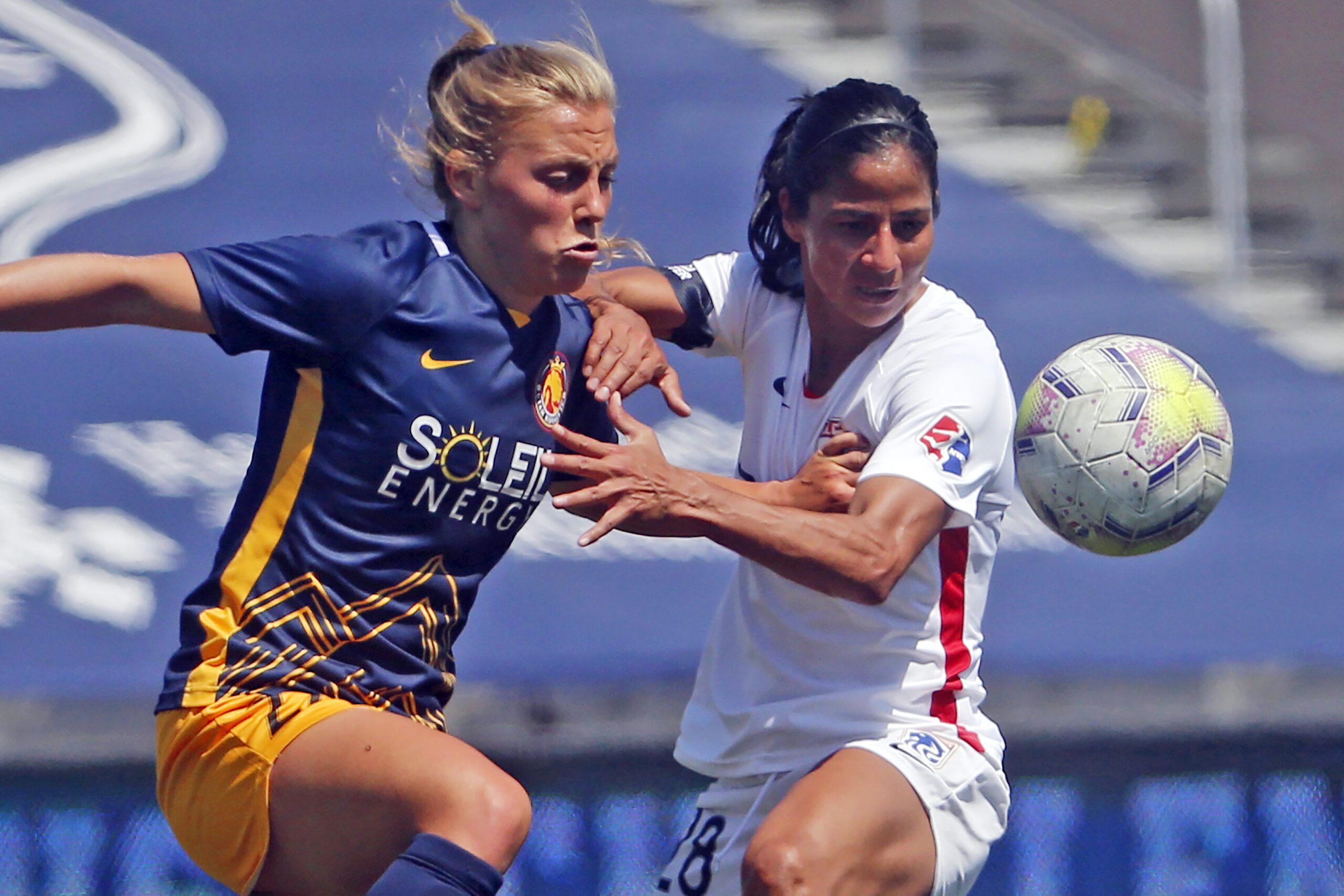 Utah Royals FC defender Madeline Nolf, left, battles with OL Reign midfielder Shirley Cruz, right, during the first half of an NWSL Challenge Cup soccer match at Zions Bank Stadium, Wednesday, July 8, 2020, in Herriman, Utah. The Royals are returning to Utah and the National Women's Soccer League. The NWSL and Major League Soccer's Real Salt Lake announced the second iteration of the Utah Royals on Saturday, March 11, 2023. The Royals were part of the NWSL for three seasons from 2018 to 2020.