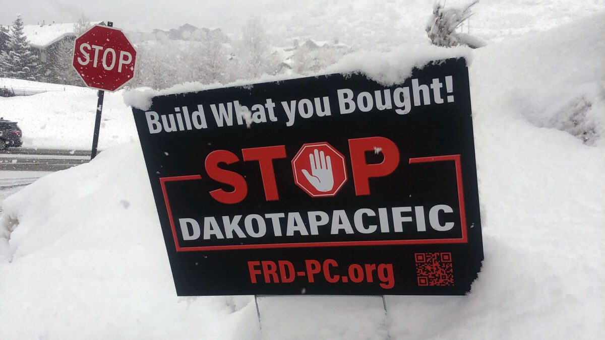 A "Stop Dakota Pacific" yard sign placed in a Park City neighborhood.
