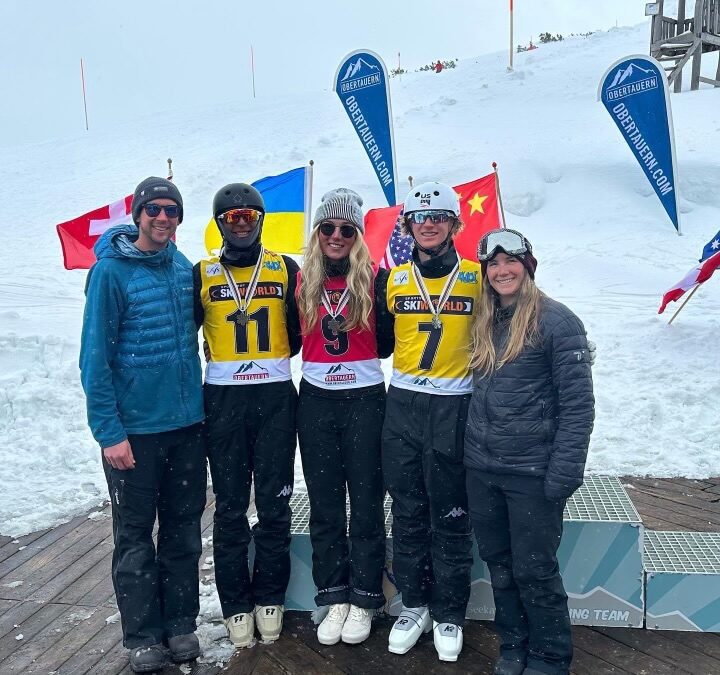 Silver Medal winning mixed Team USA with coaches Jack Boyczuk and Madie Varmette flanking left and right. Athletes from left to right are Ian Schoenwald, Amelia Glogowski, Connor Curran.