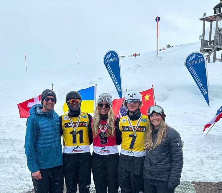 Silver Medal winning mixed Team USA with coaches Jack Boyczuk and Madie Varmette flanking left and right. Athletes from left to right are Ian Schoenwald, Amelia Glogowski, Connor Curran.