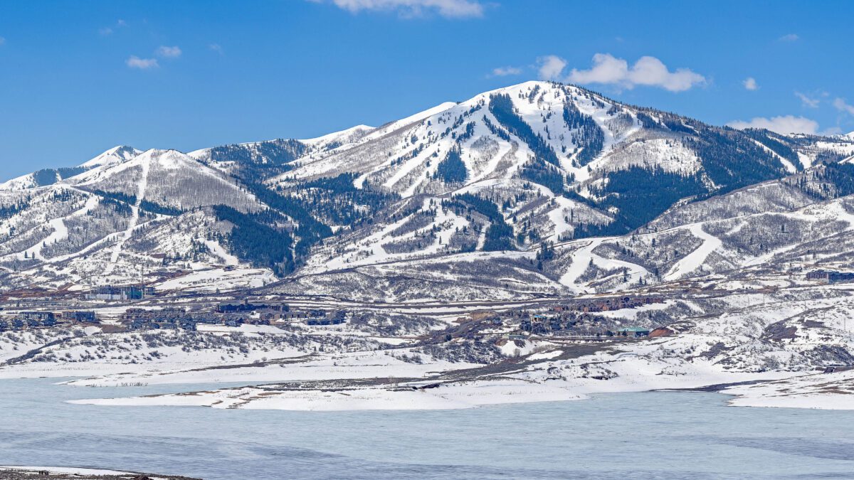 Panorama of Jordanelle Reservoir with Deer Valley Resort in the distance.