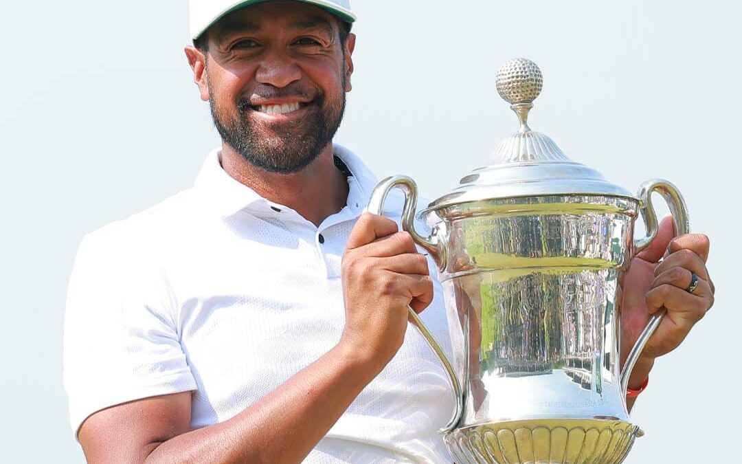 Tony Finau with his champions trophy at the Mexico Open on the PGA Tour.
