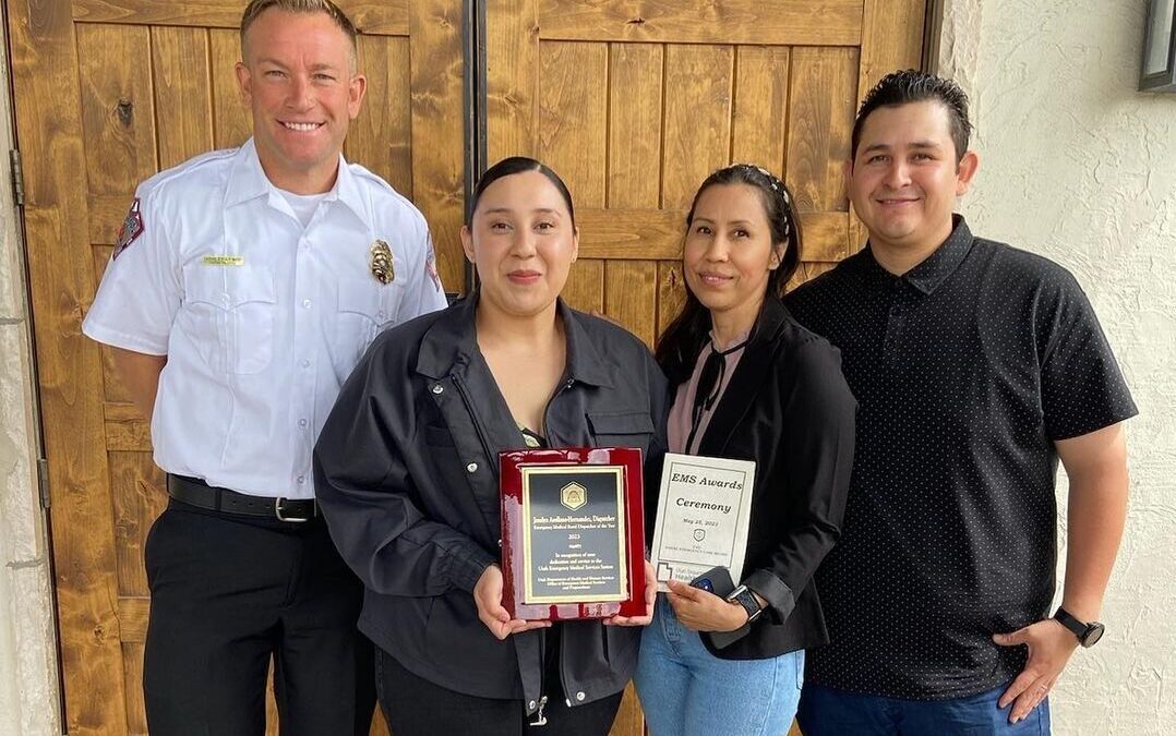 Award-winner Joselyn Arellano-Hernandez with her mom, stepdad, and PCFD Battalion Chief Ashley Lewis.
